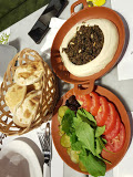 على الحطب - مسقط